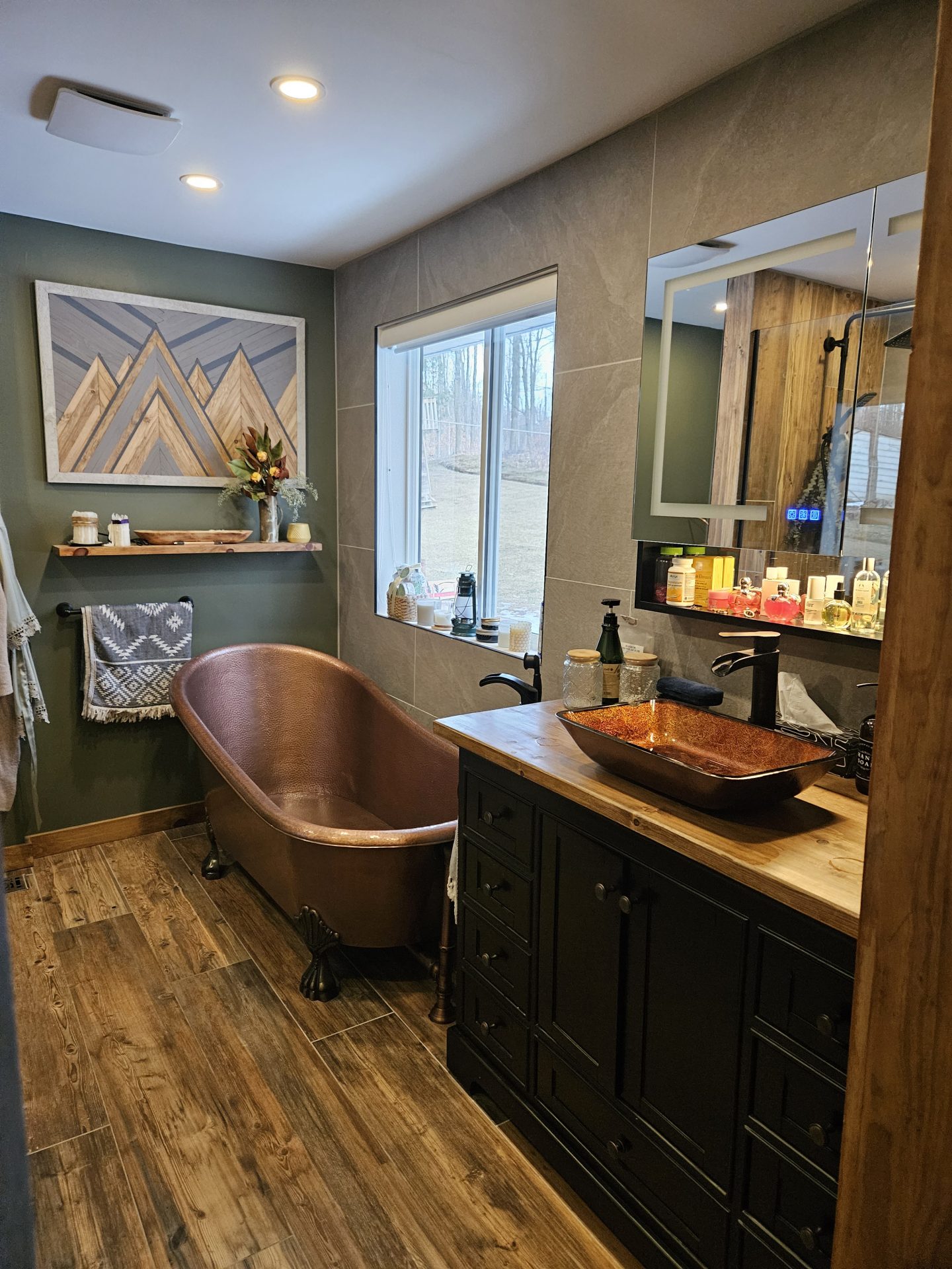 Modern rustic bathroom with copper freestanding tub