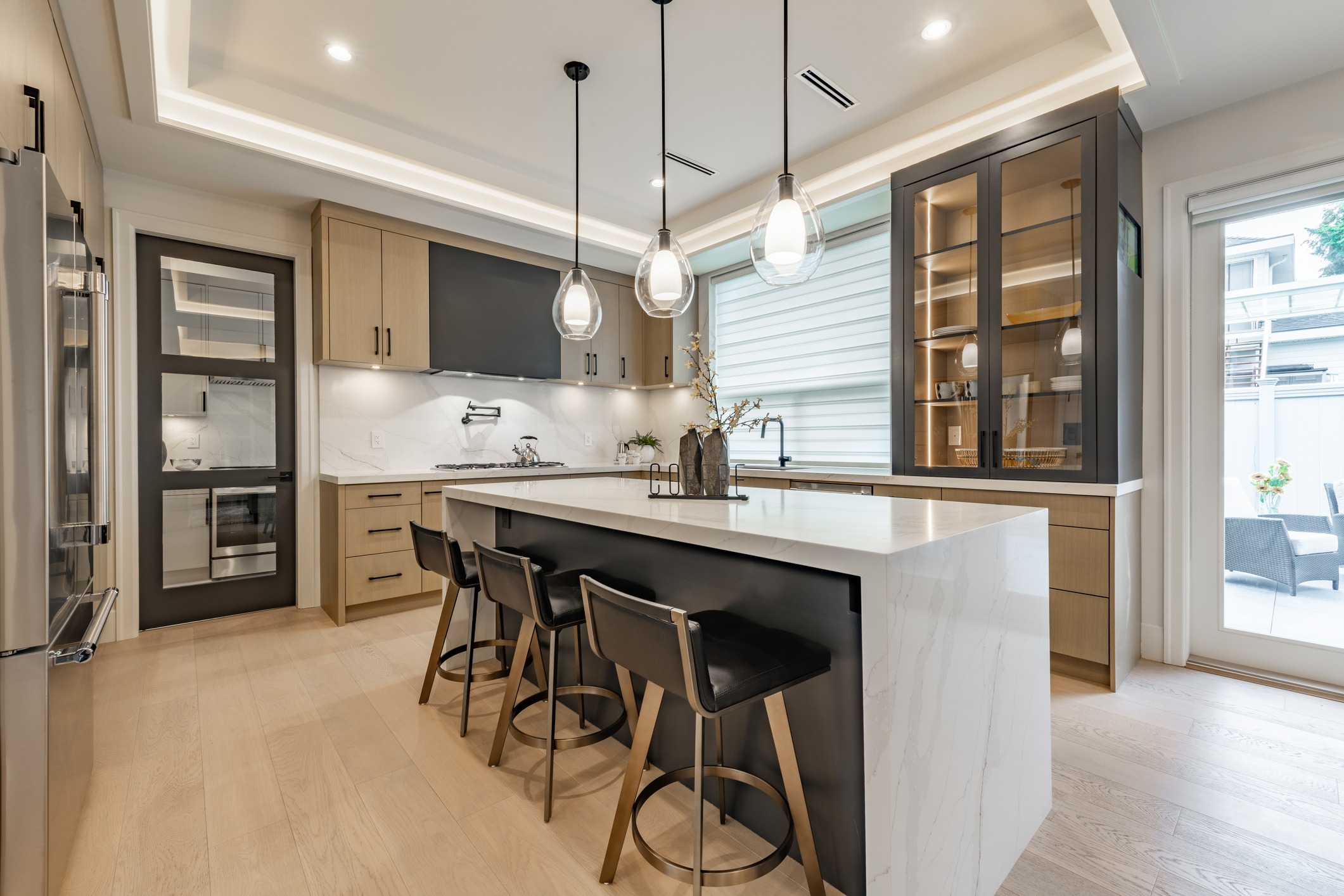 Modern kitchen with island and pendant lighting