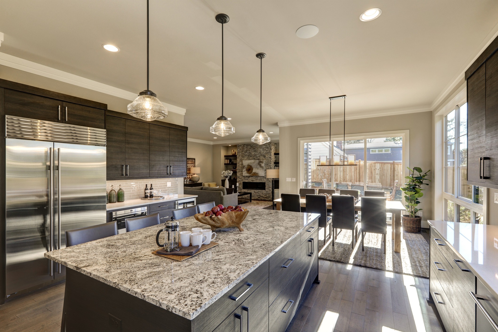 Modern open-concept kitchen with granite island